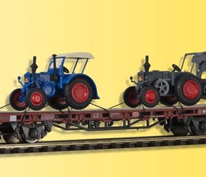 26252 Kibri H0 Niederbordwagen mit 2 LANZ Bulldogs, Fertigmodell